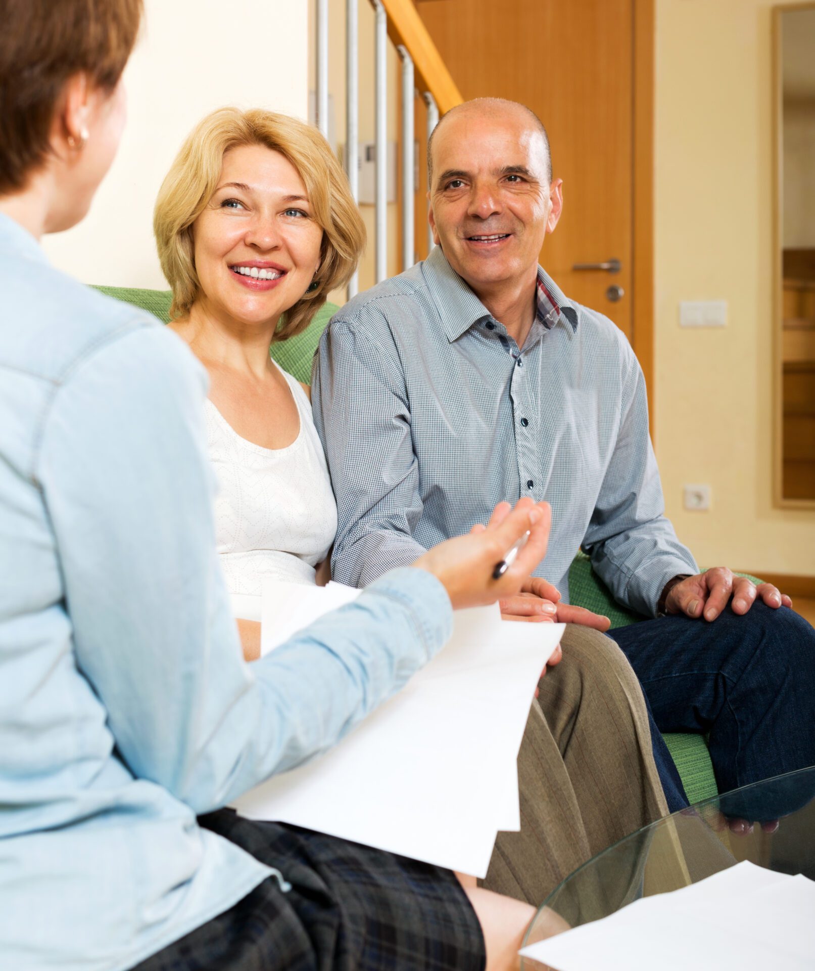 Mature couple with insurance agent Mature couple with insurance agent